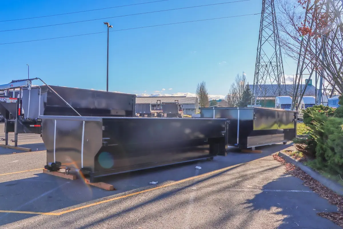 Roll-off dumpster ready for waste disposal at job site for Demolition Dumpster Rental in Black Diamond